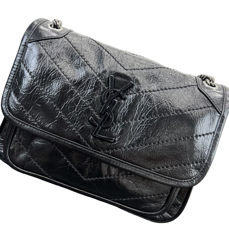 Saint Laurent Niki Baby Vintage Leather Slouchy Chain Tas Zwart